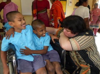 President Ms. Monica Tosi with Special Children at IPW